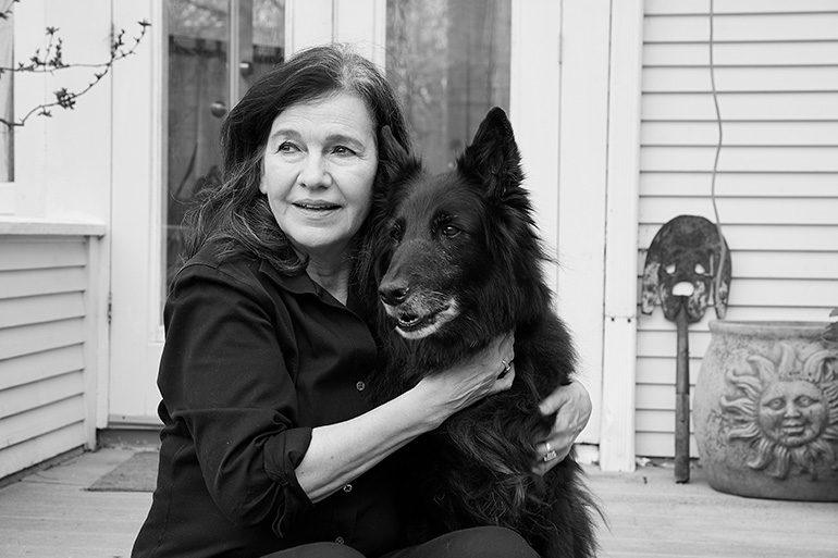 Portrait of Louise Erdrich with dog